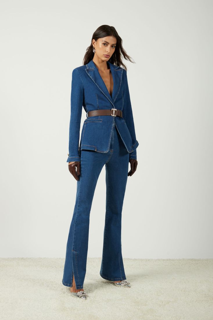 Jeans flare a vita alta con spacchi laterali