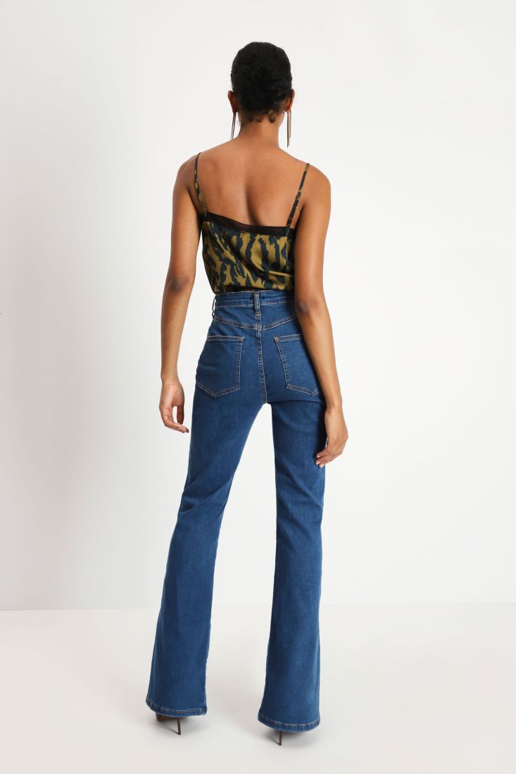 Jeans flare a vita alta con spacchi laterali